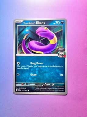 team rocket’s ekans - 112/182 (common) — pokemon: destined rivals
